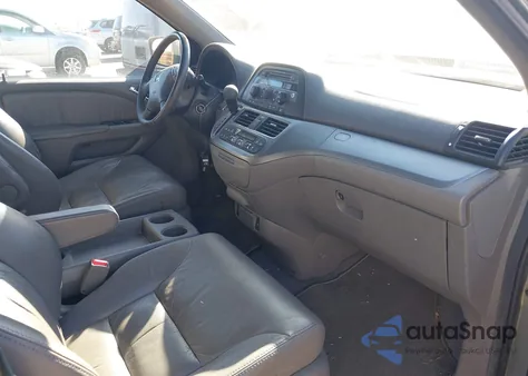 2010 Honda Odyssey Ex-L z USA, uszkodzony, nr VIN 5FNRL3H66AB102575